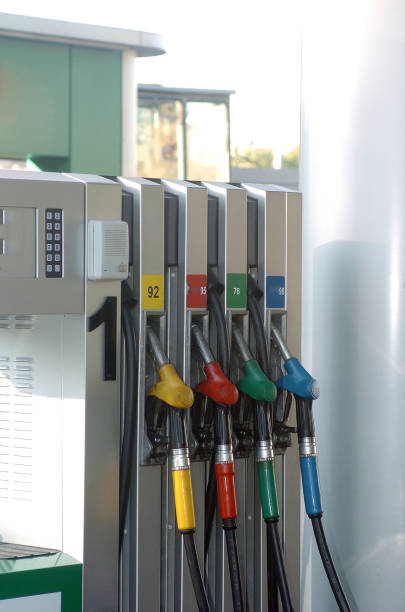 Colorful Petrol pump filling nozzles , Gas station in a service in daytime